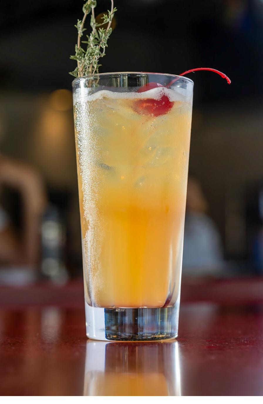 Craft cocktail with fresh herbs