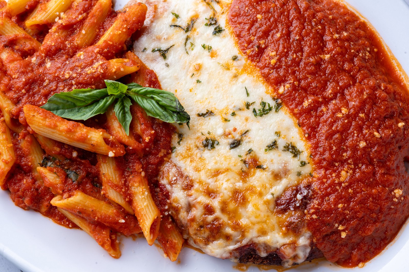 Sami's chicken parmigiana with penne pasta
