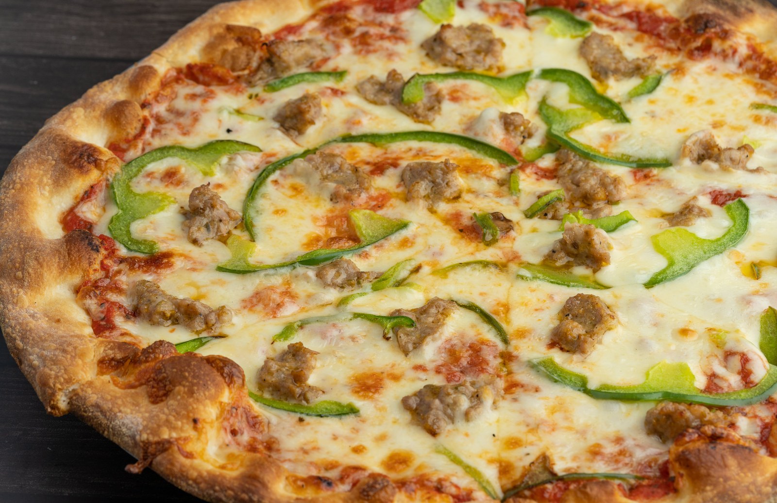 Sami's sausage and green pepper pizza